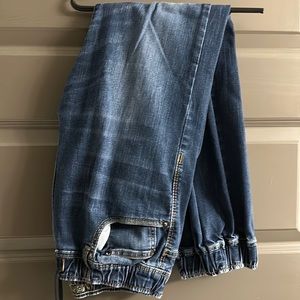 Dark blue heavily worn denim Jean American eagle brand jogger. Men’s Size Small.